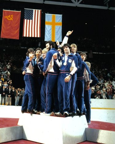 team-shot-on-podium-0704.jpg team-shot-on-podium-0704.jpg