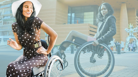 A stylish woman in a polka dot dress and white hat smiles while sitting in a wheelchair. Behind her, a semi-transparent image offers another perspective of Tae McKenzie outdoors near a modern building.