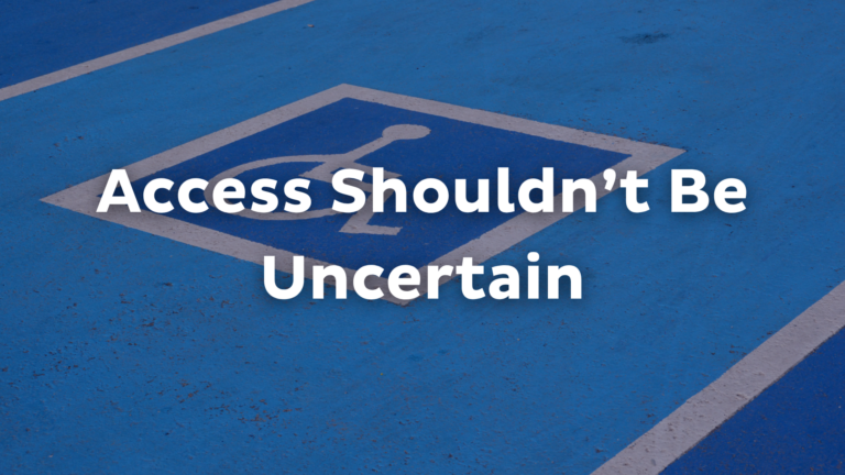 Blue disabled parking spot with a white wheelchair symbol and the text “Access Shouldn’t Be Uncertain” highlights accessibility, inspired by Vance's Story, in bold white letters across the image.
